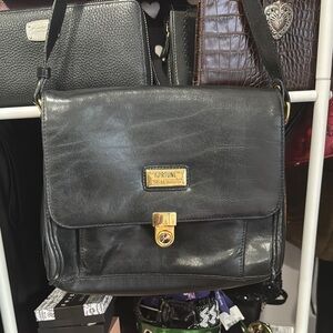 Black Leather Shoulder Bag with Gold Accents